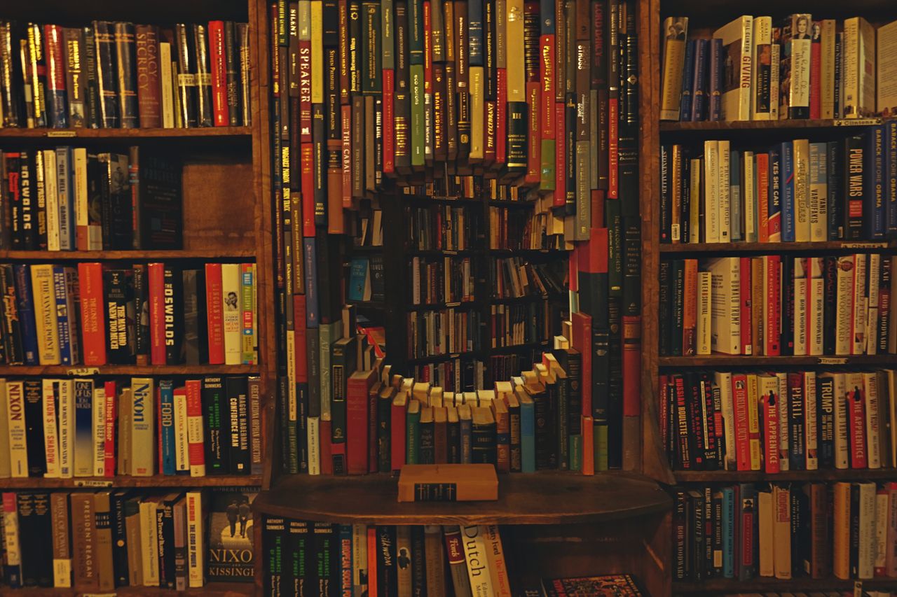 Crafting Captivating Headlines: Your awesome post title goes here Charming bookstore with unique circular book arrangement creating visual interest and appeal.